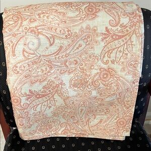Tommy Bahama Home bohemian table topper in soft muted pumpkin cream and blues